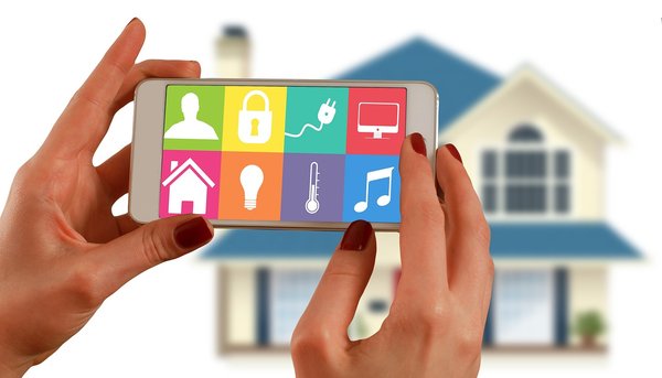 How can you use smart technology to improve water efficiency in a UK home?